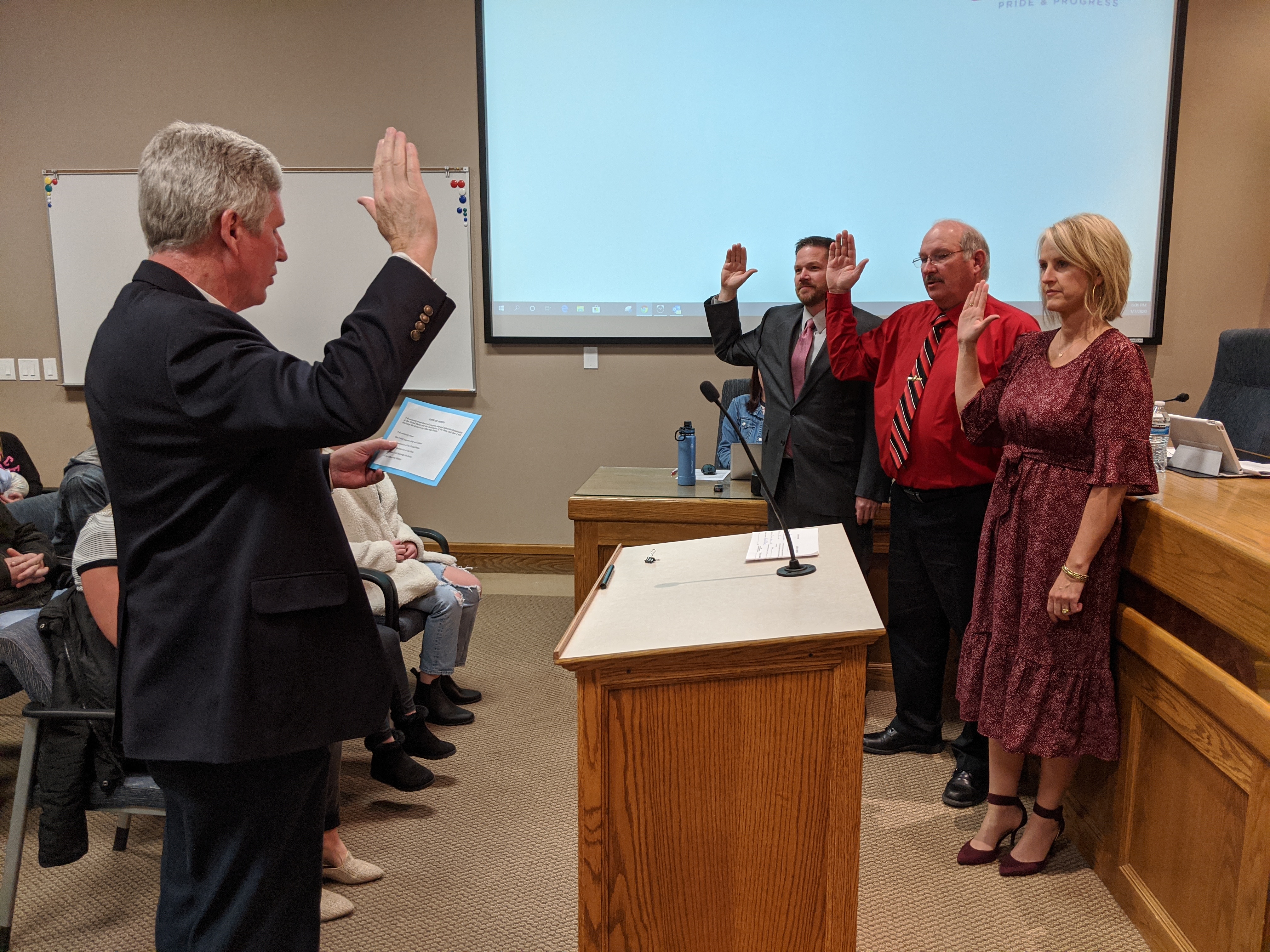 City Council Members Stacy Beck, Chard Argyle, and Brandon Gordon take the Oath of Office, as administered by City Recorder Kent Clark.